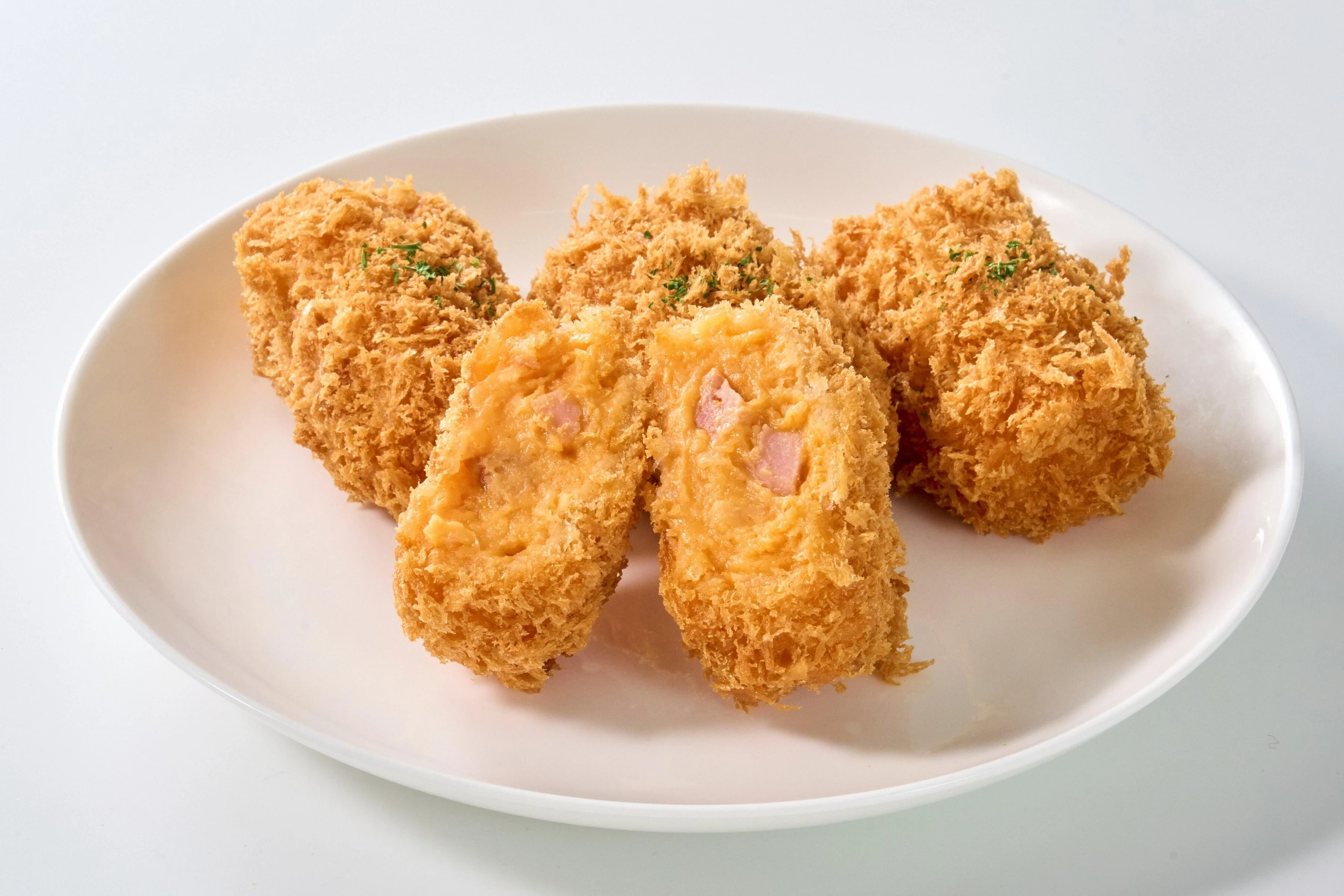 「トマトクリームコロッケ ～ベーコン＆オニオン～」を4/10新発売